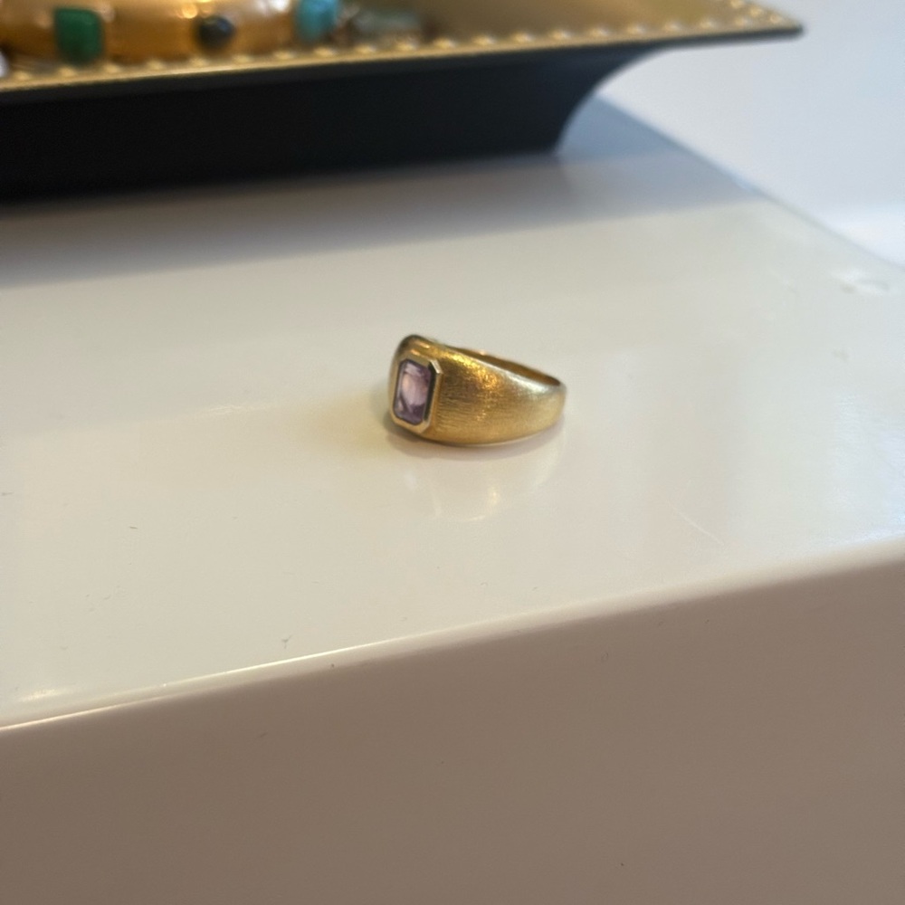 Gold Ring with Purple Gemstone